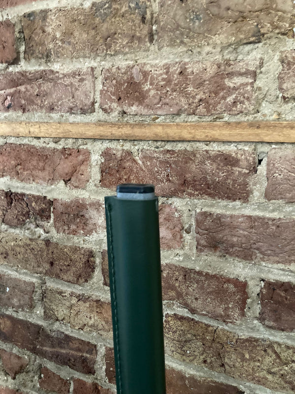 A set of eight Roche Bobois leather Holly Dining chairs