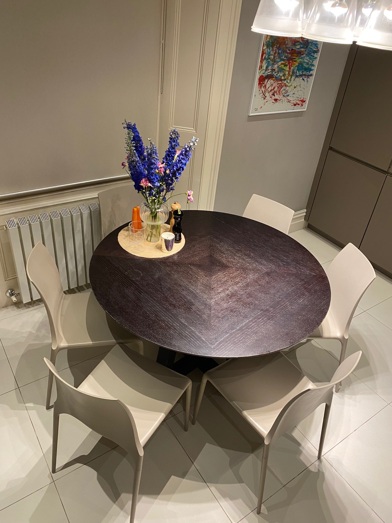 A round Dining table and chair set by Ligne Roset