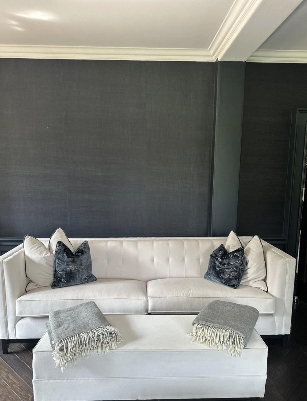 Pair of bespoke Alexander sofas by Covercraft Upholstery and matching Footstool