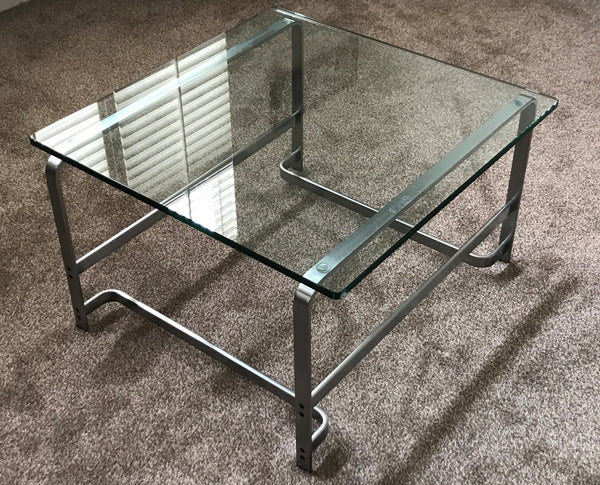 A Walter Knoll Glass and Steel Coffee Table