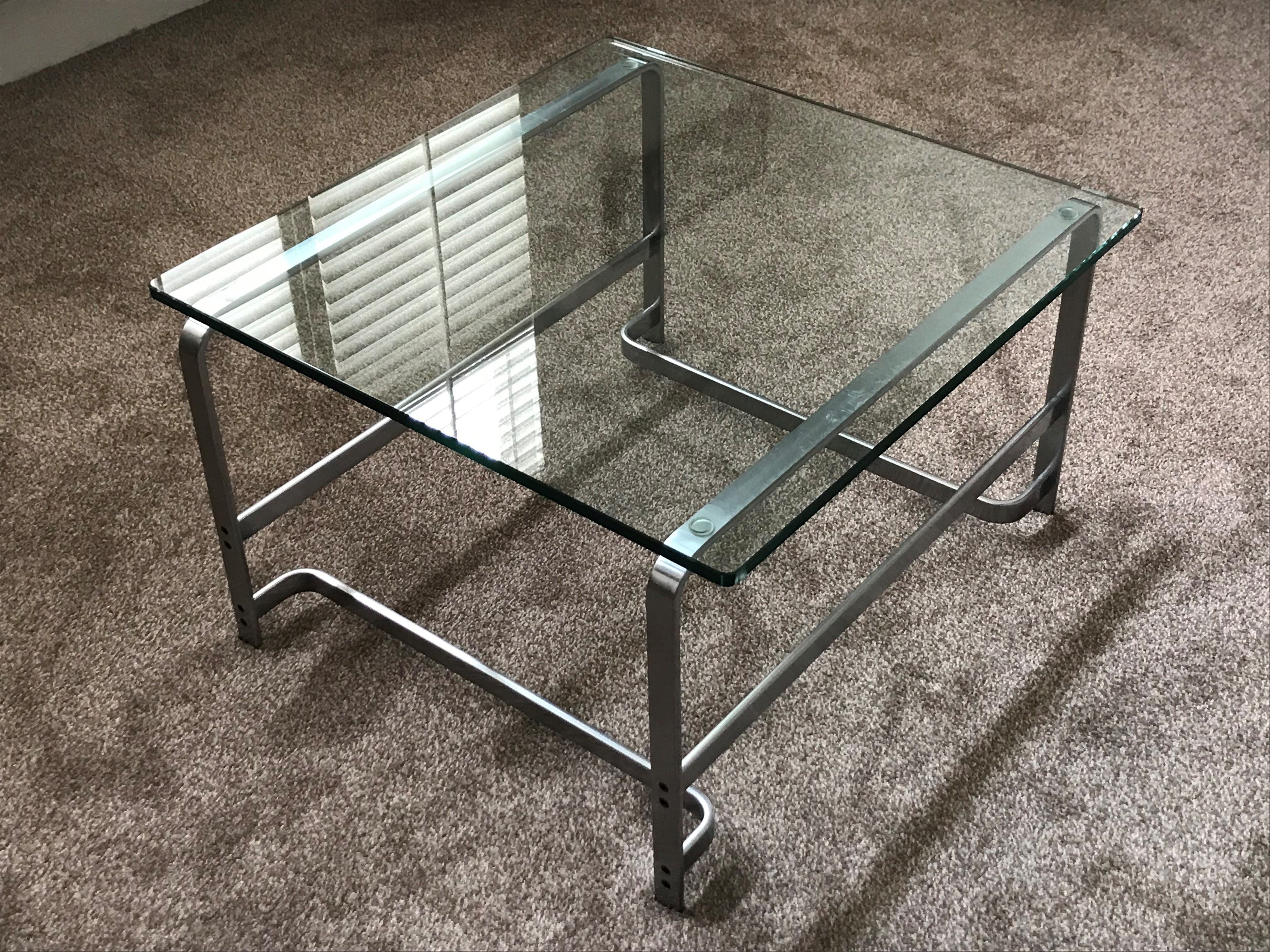 A Walter Knoll Glass and Steel Coffee Table