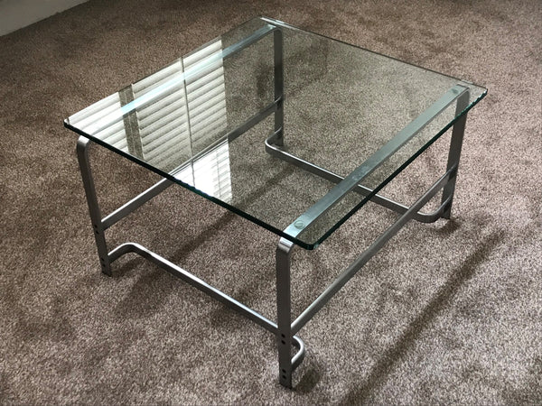 A Walter Knoll Glass and Steel Coffee Table
